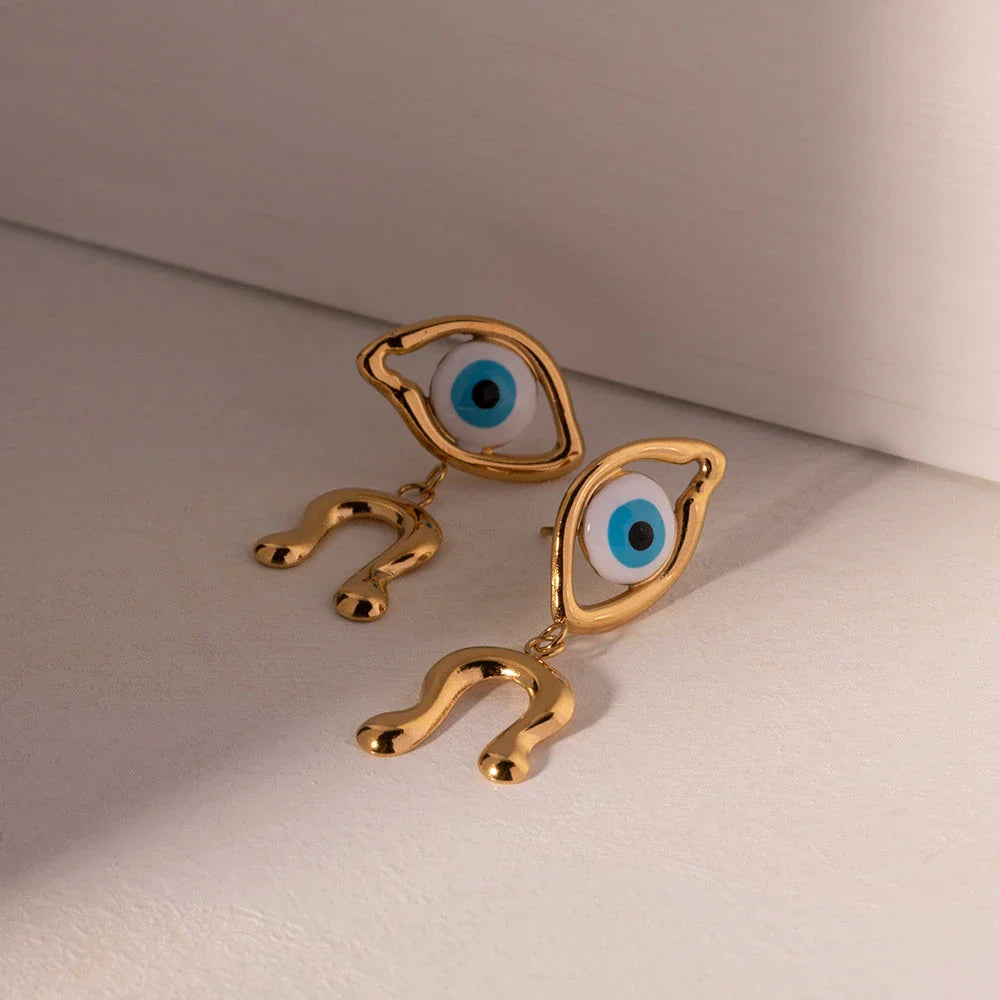 Pair of 18K gold plated stainless steel asymmetrical devil's eye earrings with a dripping oil finish