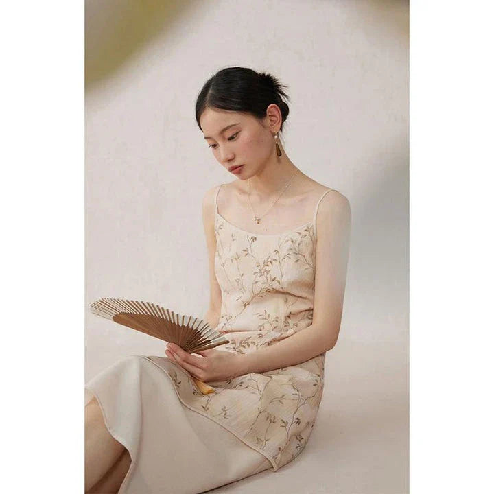 Elegant floral A-line midi dress with spaghetti straps and lace accents