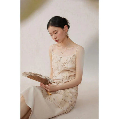 Elegant floral A-line midi dress with spaghetti straps and lace accents