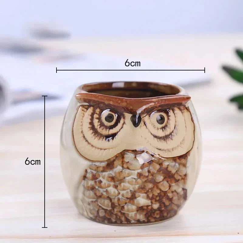 Adorable mini owl-shaped ceramic planter for small plants and succulents, featuring vibrant colors and vintage charm