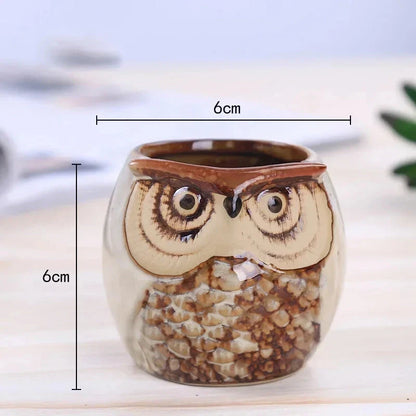 Adorable mini owl-shaped ceramic planter for small plants and succulents, featuring vibrant colors and vintage charm