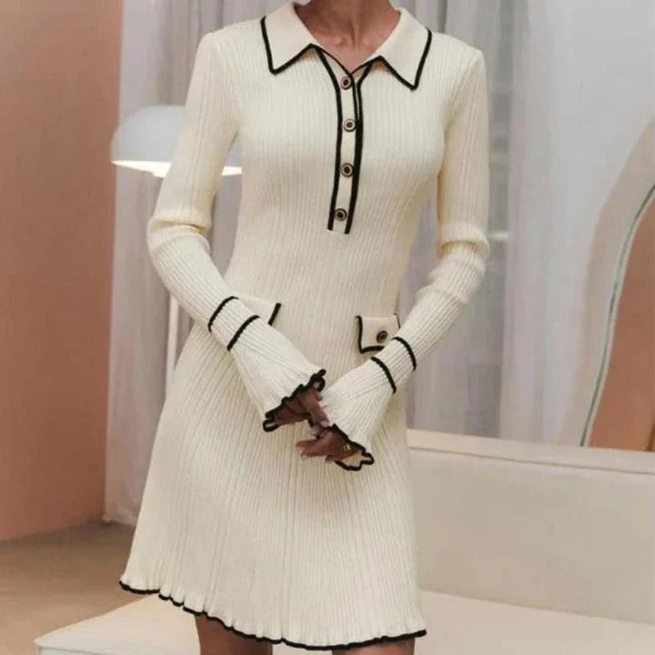 Elegant ruffled knit mini dress in black with high stretch fabric and patchwork pattern for a sophisticated and comfortable look