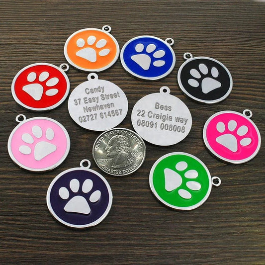 Customized stainless steel dog ID tags in various colors with space for engraving pet's name and contact details