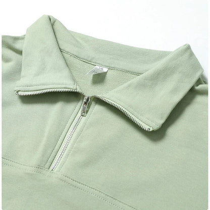Cozy cotton pullover with zipper detail, available in purple, black, and gray colors