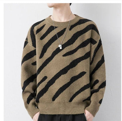 Cozy velvet sweater in sand brown color, featuring a soft, velvety texture and thick, insulating fabric for warmth and style.