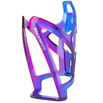 A stylish, lightweight cycling bottle holder with a two-tone design, securely holding a water bottle on a bike.