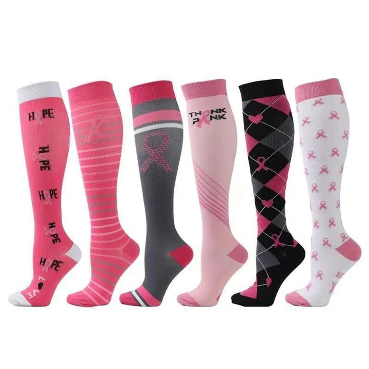 Pairs of long tube compression sports socks in a variety of stylish color combinations
