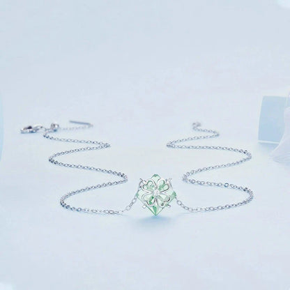Elegant platinum-plated adjustable green pendant necklace with a sleek, silver-toned chain and a stylish green pendant