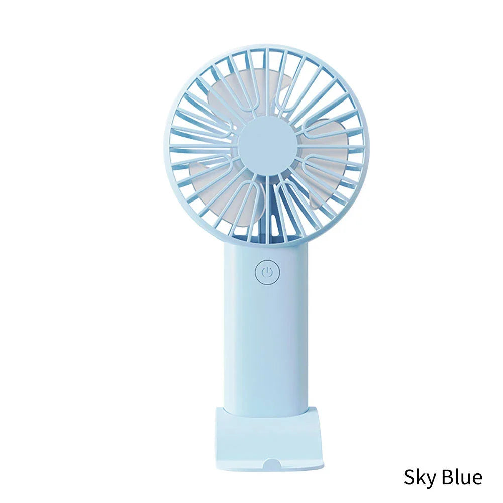 Compact USB Rechargeable Mini Handheld Fan with 3 wind modes, desktop stand, and phone holder for cooling anywhere