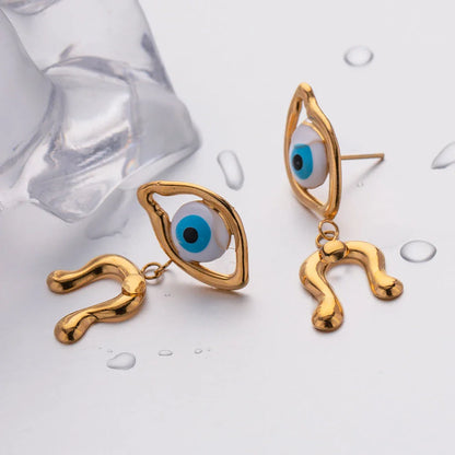 Pair of 18K gold plated stainless steel asymmetrical devil's eye earrings with a dripping oil finish