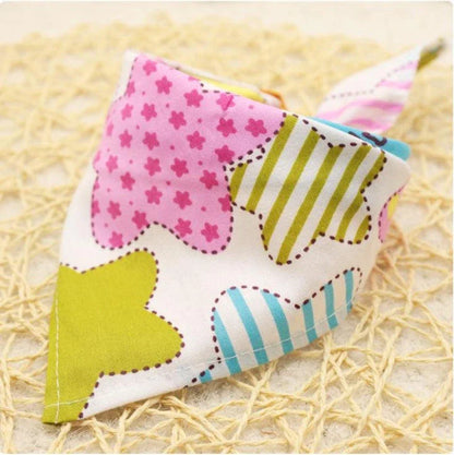 Adorable Cartoon Patterned Triangular Dog Scarf in vibrant colors, perfect for keeping your pup warm and stylish