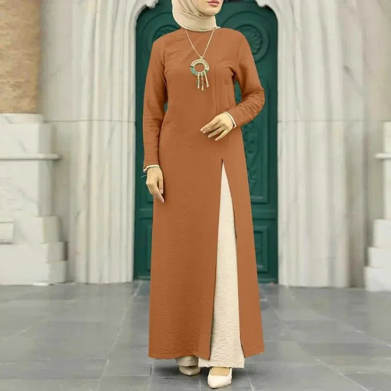 Elegant polyester dress with long sleeves, high slit hem, and available in caramel, black, blue, green, and pink colors