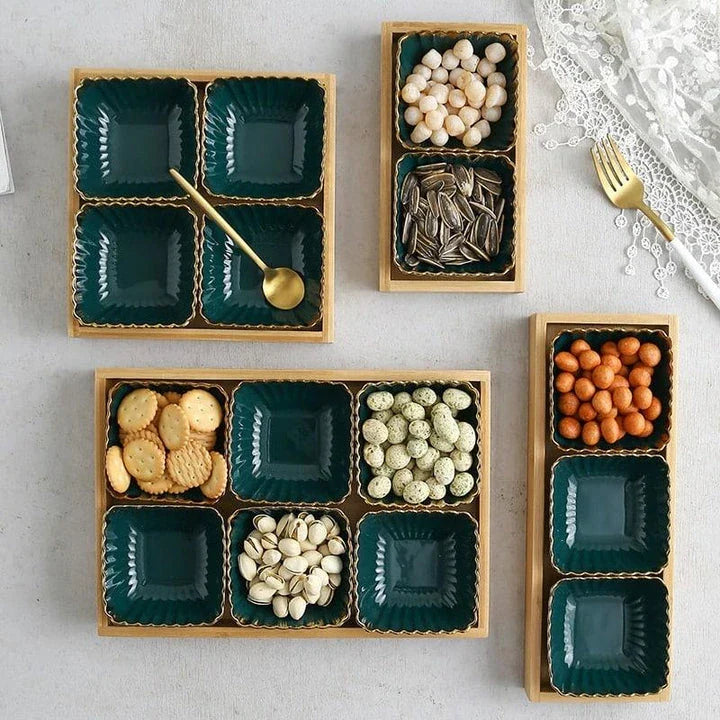 Elegant green and gold ceramic serving platter with a wood trim, perfect for hosting and elevating your dining experience.