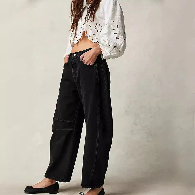 Trendha wide-leg summer pants in light blue, white, and black colors with a relaxed, stylish design