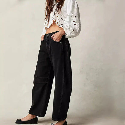 Trendha wide-leg summer pants in light blue, white, and black colors with a relaxed, stylish design