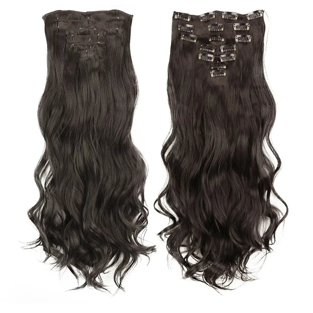 Model wearing long, wavy ombre clip-in hair extensions that blend seamlessly with her natural hair