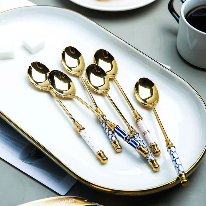Elegant vintage gold and ceramic coffee, dessert fork and spoon set with hand-painted classical designs