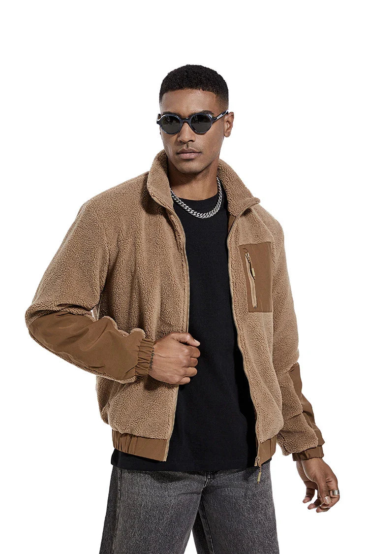 A cozy and stylish men's fleece jacket with a standing collar and convenient side pockets, available in a range of classic colors.