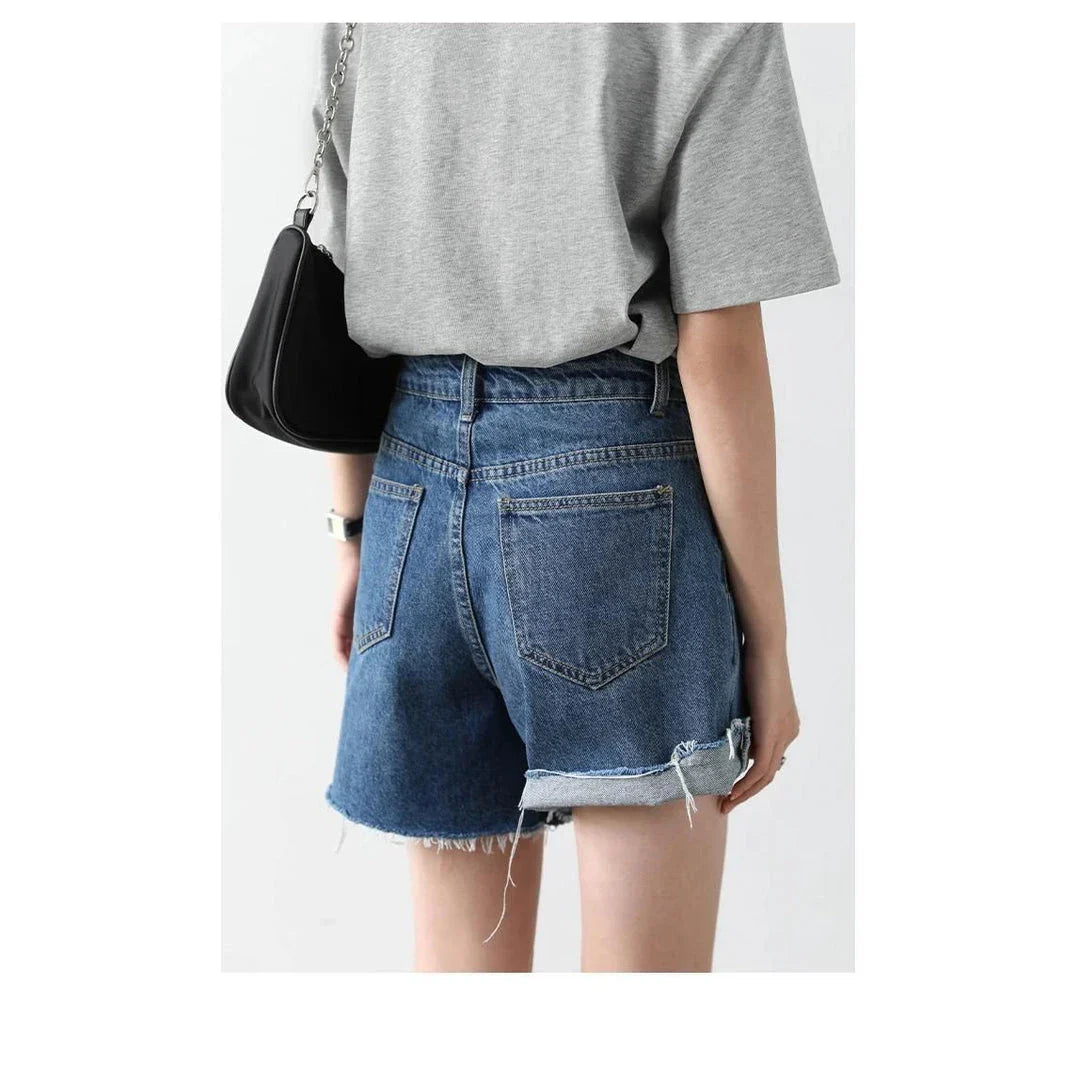 Women's Retro Blue High-Waisted Denim Shorts with Irregularly Cut Design and Cuff Details