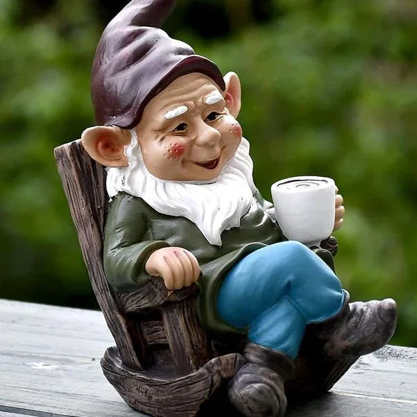 Charming outdoor garden gnome decoration made of durable resin, featuring a relaxing gnome on a rocking chair