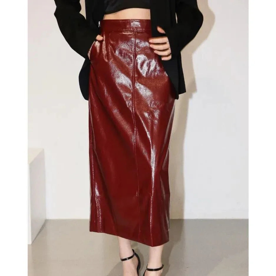 Reflective leather midi pencil skirt with a flattering high-waist design and eye-catching reflective material