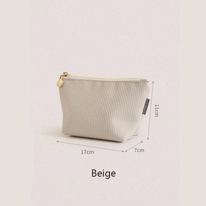 Mini portable waterproof cosmetic bag in beige and gray colors with a foldable design for convenient storage