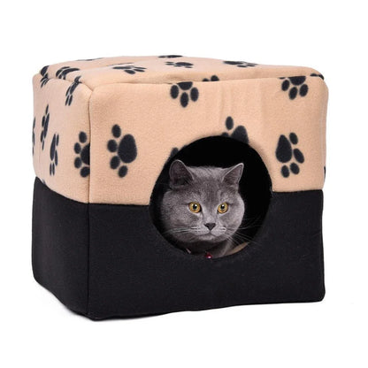 A plush, white pet bed with a stylish paw print design, providing a cozy and comfortable resting space for dogs or cats.