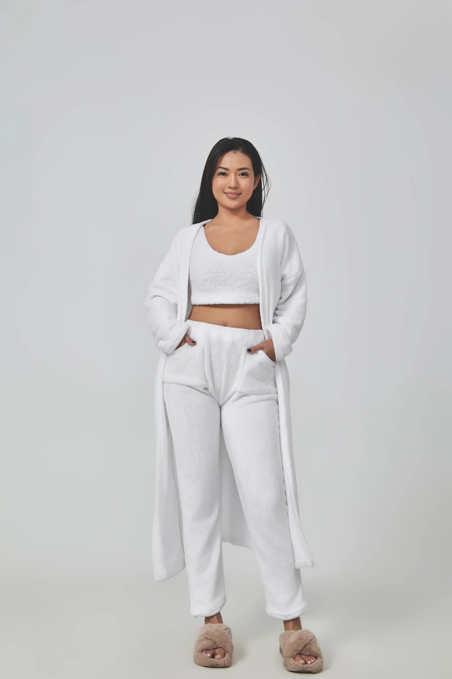 Cozy 3-piece loungewear set in pastel colors including crop top, wide-leg pants, and matching cardigan