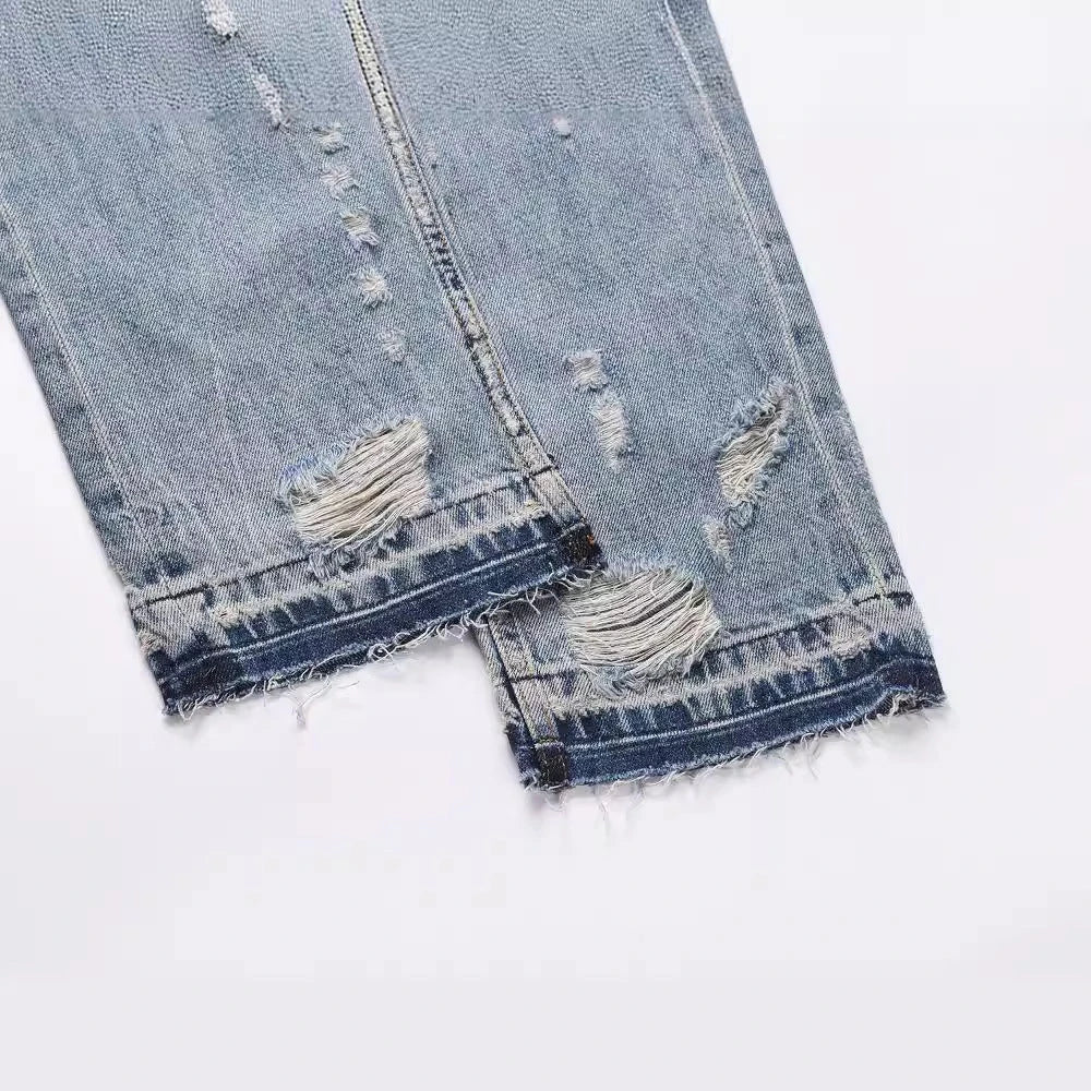 Premium distressed denim jeans with ripped detailing, perfect for casual streetwear style