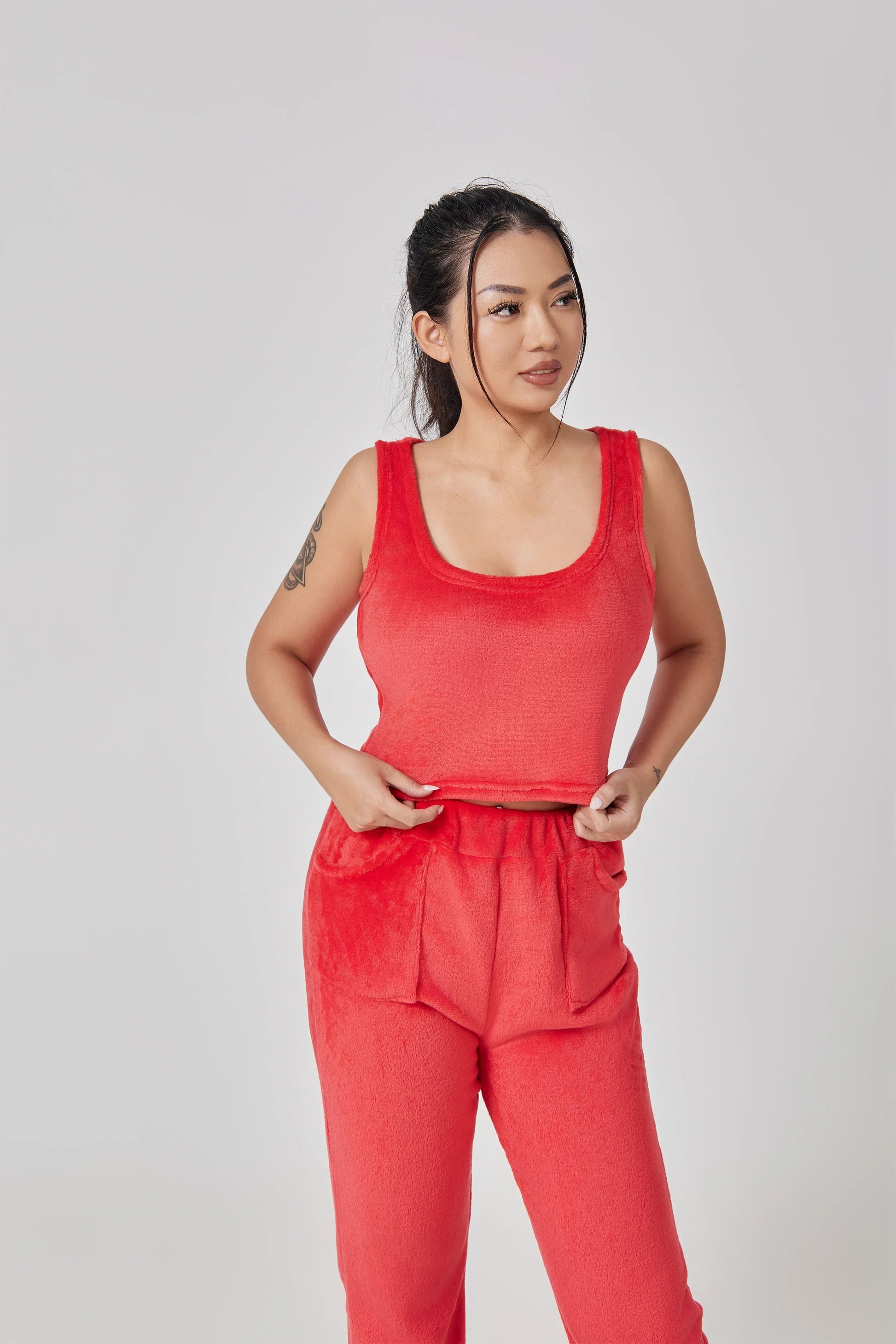 Cozy 3-piece loungewear set in pastel colors including crop top, wide-leg pants, and matching cardigan