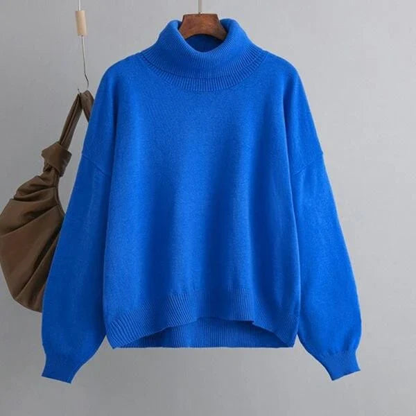 Chic and cozy oversized turtleneck sweater for women in a solid color, perfect for cold weather fashion and style