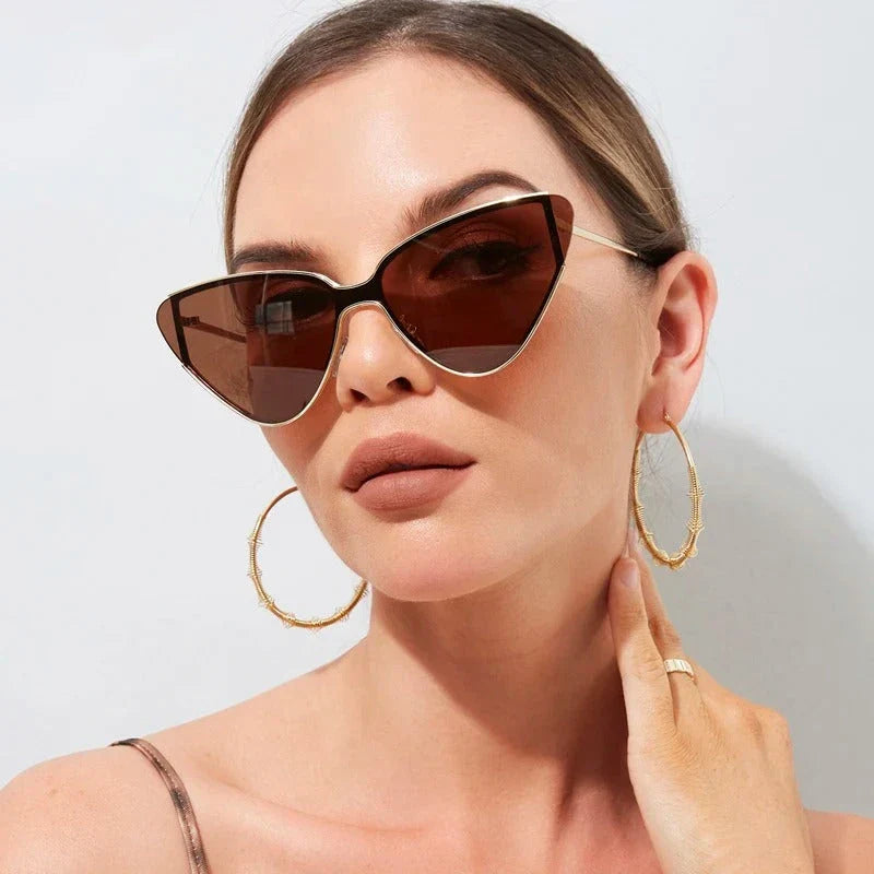 Fashionable steampunk-inspired cat eye sunglasses with gradient lenses and UV400 protection for men and women