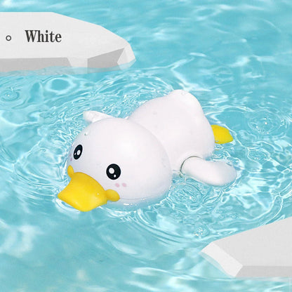 A set of colorful clockwork bathing ducks swimming in the water, providing fun and engaging bath time entertainment for children aged 0-6 years.
