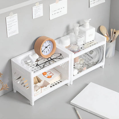 Sleek white desktop organizer with two-tier storage compartments for keeping office supplies, cosmetics, and other essentials neatly organized on a desk or countertop