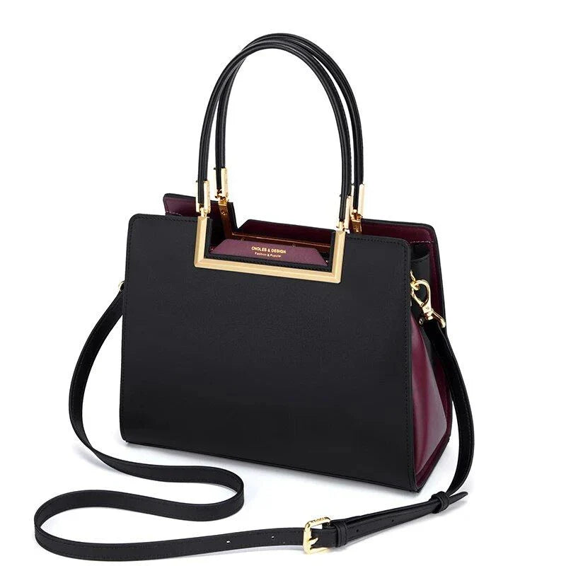 Elegant and spacious black leather tote bag with multiple compartments and a luxurious design