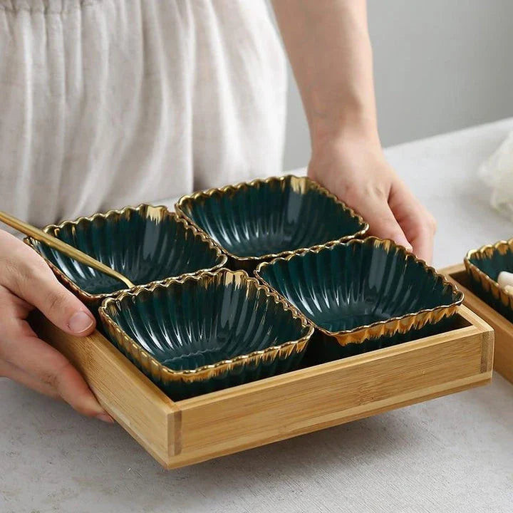 Elegant green and gold ceramic serving platter with a wood trim, perfect for hosting and elevating your dining experience.