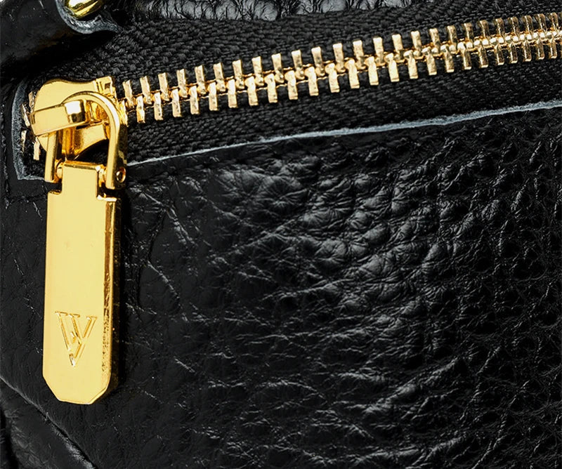 Premium leather crossbody bag with adjustable strap, multiple pockets, and sleek Korean-inspired style