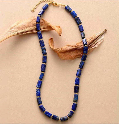 Elegant red natural stone necklace with an adjustable stainless steel chain, perfect for adding a touch of natural beauty to any outfit.