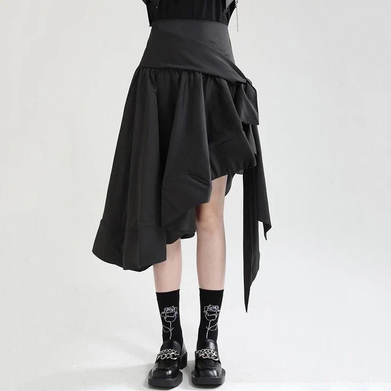 A black high-waist asymmetrical ruffle skirt with a unique design and flattering silhouette.