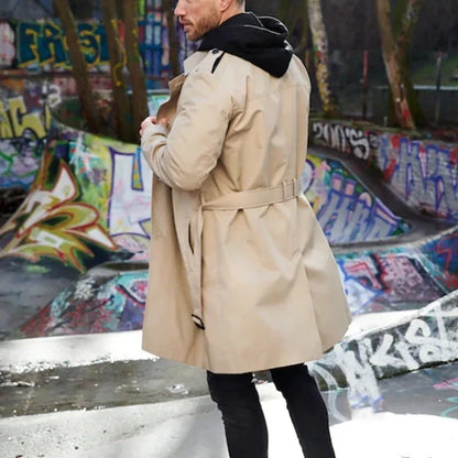 Stylish men's double-breasted trench coat in light gray color with slim fit silhouette