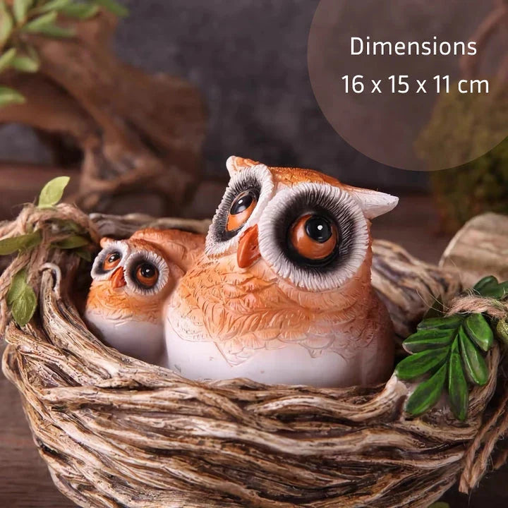 High-quality resin sculpture of a mother owl and her baby nestled in a cozy nest, perfect for adding natural charm to home and garden decor