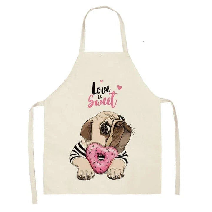 Charming pug-themed apron with a vibrant print, made of durable cotton and linen materials for practical kitchen use.