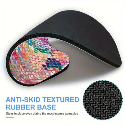 Dazzling pink disco ball-patterned mouse pad with a smooth, rubber surface and non-slip base for a stylish and functional desk accessory.