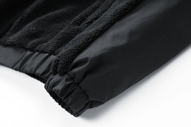 A cozy and stylish men's fleece jacket with a standing collar and convenient side pockets, available in a range of classic colors.