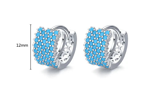 Pair of elegant silver hoop earrings with a micro-insert design, perfect for adding a touch of sophistication to any outfit.