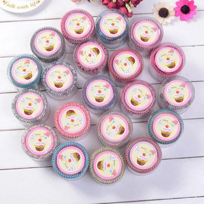 100 pack of eco-friendly, greaseproof cupcake liners in various pastel colors