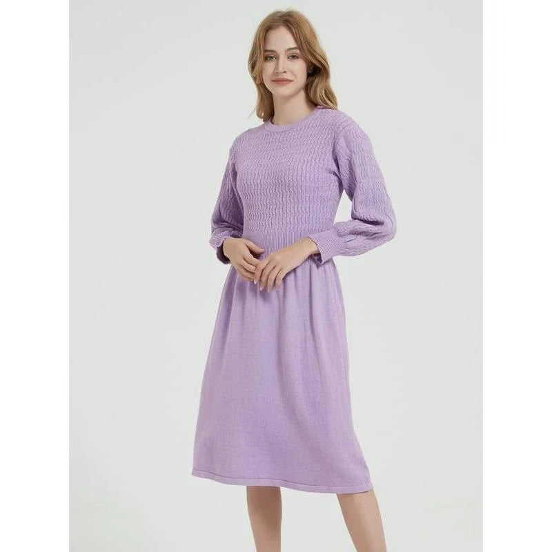 Elegant long sleeve knitted sweater dress in purple red with a classic A-line silhouette and mid-calf length