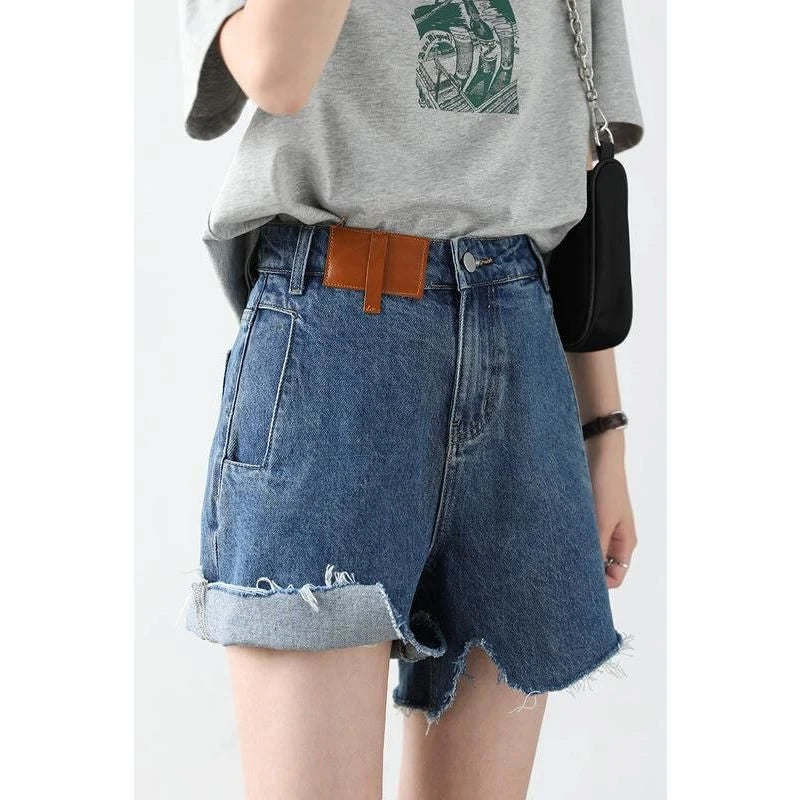 Women's Retro Blue High-Waisted Denim Shorts with Irregularly Cut Design and Cuff Details