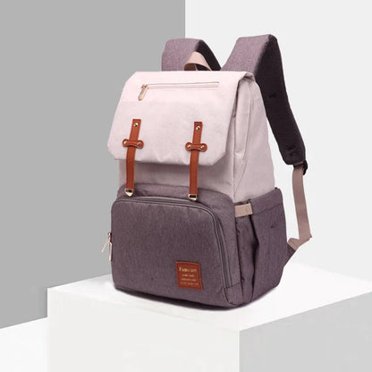 Premium diaper backpack with insulated pockets, stroller attachment, and USB charging port
