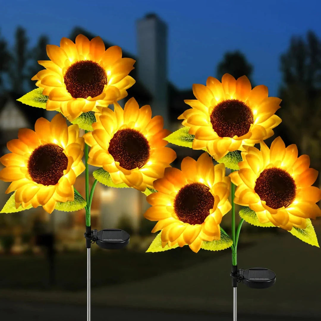 Realistic solar-powered sunflower garden lights for outdoor decor, illuminating a patio or backyard with a warm, enchanting glow.